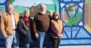The right image . . .mural at Wolfe County Farm Bureau office honors rural culture