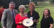 Steve Wilson and Laura Lee Brown receive the 'Linda Bruckheimer Excellence in Rural Preservation Award' from Preservation Kentucky